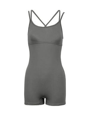Grey active romper with scoop neck and criss-cross straps, cotton blend.
