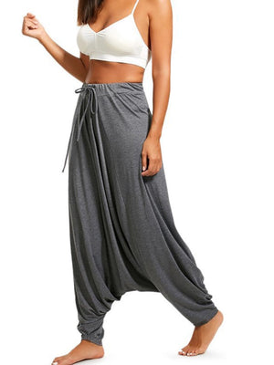 Charcoal drape-front harem pants with drawstring waist and cinched ankles.