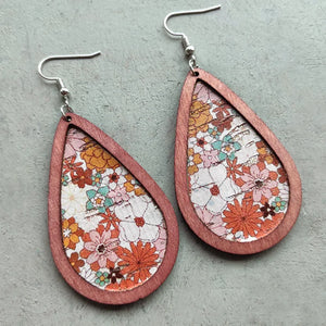 Floral teardrop woodgrain earrings in caramel with a vintage floral pattern.