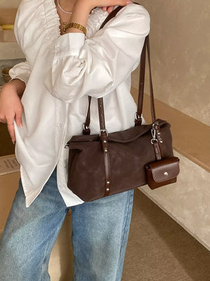 Leather Shoulder Bag With Detachable Pouch in Brown, model styling view
