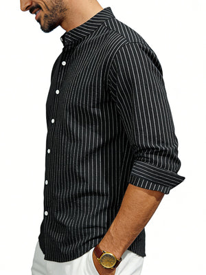 Black pinstripe long sleeve men's shirt with buttoned front and rolled cuffs.