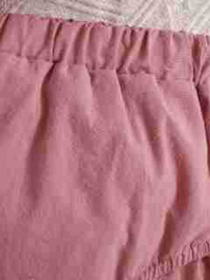 Pink baby set with ruffle trim and button detail