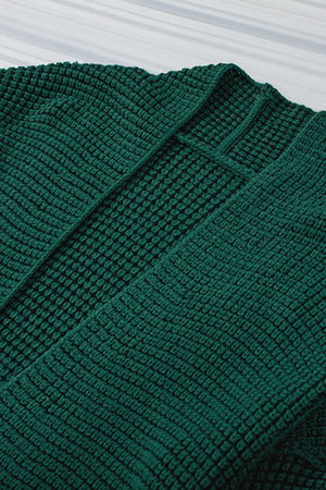 Textured open cardigan in Black Forest acrylic with a waffle knit pattern.
