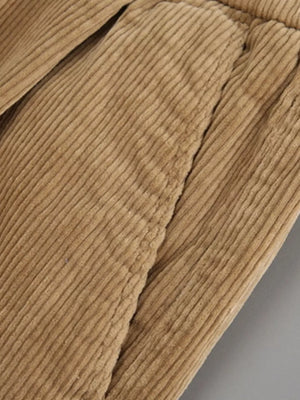 Khaki corduroy pants with subtle pleats and visible stitching detail.