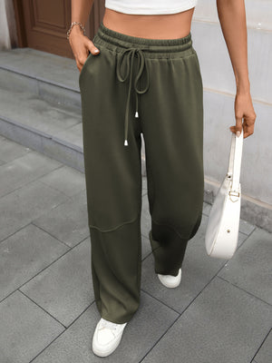 High-waist drawstring wide-leg pants in Army Green with pockets and a relaxed fit.