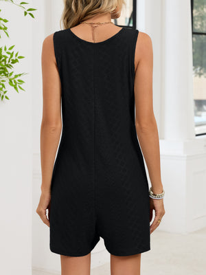 Black textured sleeveless romper with a V-neck, shown from the back.