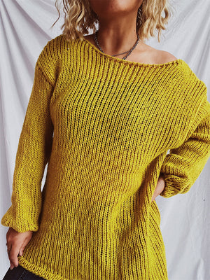 Mustard open-knit slouchy boatneck pullover sweater with long sleeves.