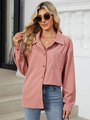 Pink corduroy overshirt with patch pockets and button front.