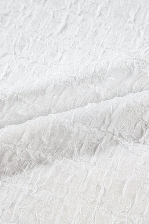 White textured blouse with crinkled fabric detail