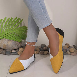 Chic pointed-toe slip-on flats in yellow, white, and black color block.
