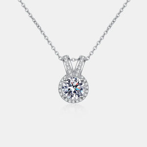 Silver halo diamond pendant necklace with rabbit ear detail on 925 sterling silver chain.