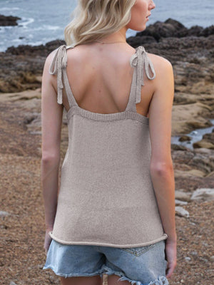 Knit tank top in Mocha with tie straps and deep V-neck, styled with denim shorts.