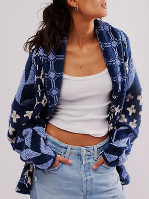 Geometric patchwork knit cardigan in blue with a relaxed fit and open front.