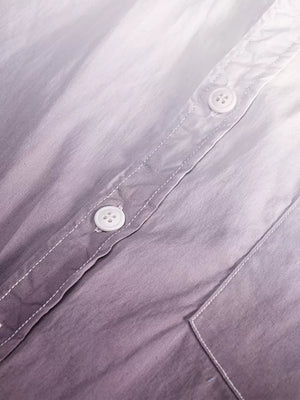 Men's cotton button-down shirt with a blue-to-white gradient and white stitching.