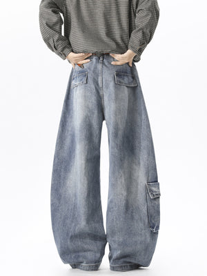 Men's blue wide leg cargo jeans in 100% cotton with multiple pockets.