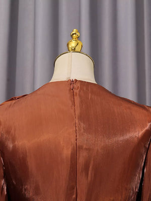 Brown satin maternity maxi dress with ruched bodice and zipper back detail.