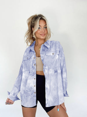Cloud Wash Overshirt in Misty Blue with patch pockets and button front, styled casually.