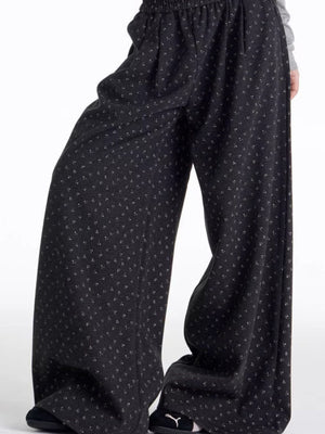 Men's dark floral wide leg sweatpants with relaxed fit and elastic waist.
