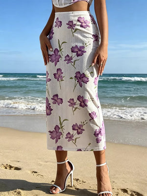 Floral crop top and midi skirt set with purple floral print and vertical stripes.