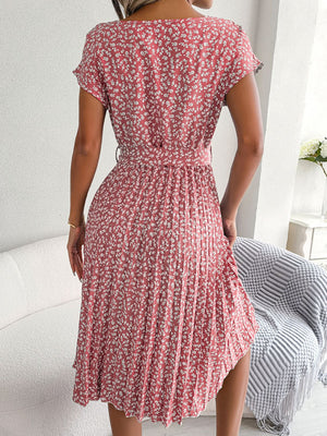 Blush pink floral print midi dress with tie waist and pleated skirt