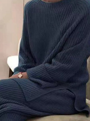 Blue ribbed knit sweater and pants set with crew neck and long sleeves.