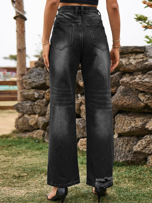 Distressed black flare denim jeans with frayed hem detail.