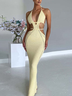 Pastel yellow knitted maxi dress with deep v-neck and cutouts