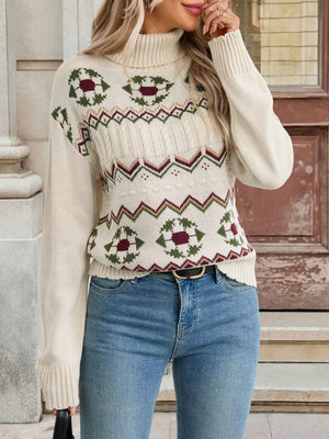 Ivory geometric cable-knit turtleneck sweater with a fair isle pattern.