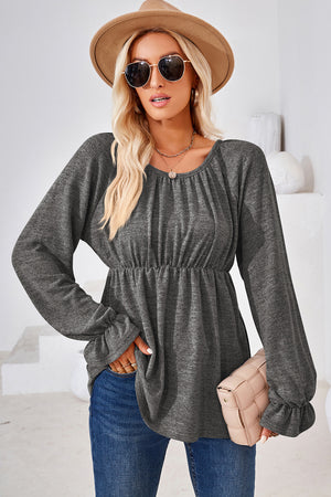 Dark Gray peasant blouse with gathered neckline and elastic waist, ruffled cuffs.