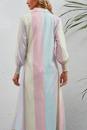 Shirtdress with vertical stripes and smocked cuffs.