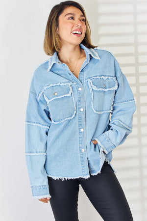 Light denim overshirt with patchwork and frayed details, featuring two chest pockets and button front.