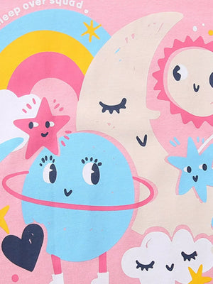 Pink cotton t-shirt with playful celestial graphic, including moon, sun, planet, stars, and rainbow.