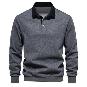 Long sleeve dark gray polo sweatshirt with black collar and two button placket.