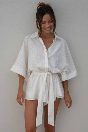 White linen kimono sleeve romper with tie waist and collar