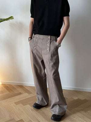 Mocha high-waisted wide leg pants with button detail and front pockets.