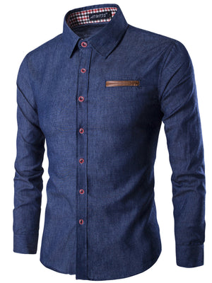 Dark blue slim fit denim shirt for men with brown faux leather chest pocket detail.