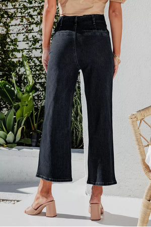 Black denim wide-leg jeans with button-fly and a cropped length.