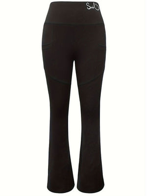 Black bootcut leggings with smile detail on waistband and pocket accents