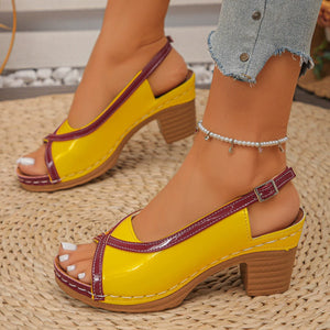 Yellow open-toe block heel sandals with burgundy trim and adjustable ankle strap.