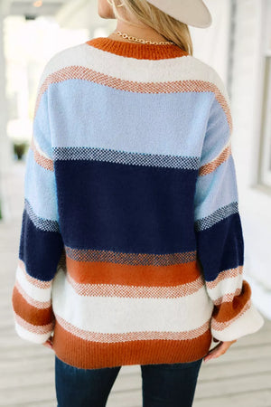 light blue tunic featuring ribbed cuffs and color-block