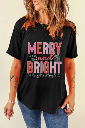 Black cotton tee with rolled sleeves and "Merry and Bright" holiday graphic.
