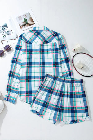 Plaid pajama set with ruffled hem shorts and long sleeve button-up shirt.