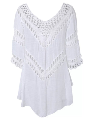 White crochet-trimmed flowy cover-up with V-neck and cutout details.