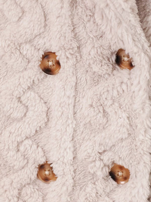 Cozy textured double-breasted pea coat in eggshell with brown buttons