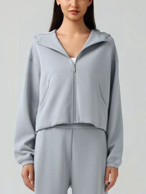 Gray cropped active zip-up hoodie with raglan sleeves and pockets
