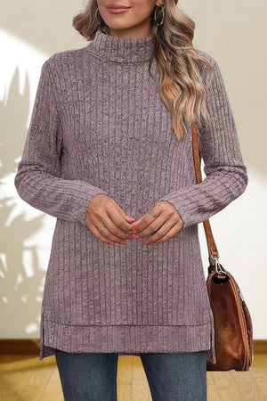 Ribbed knit turtleneck tunic top in Lavender with long sleeves and side slits.