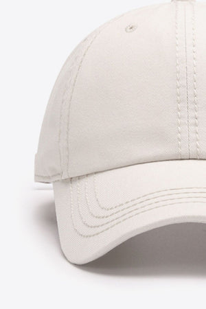 Beige canvas baseball cap with stitched details
