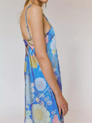 Sky blue floral maxi dress with gathered bodice and cutout back detail.