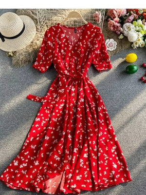 Red floral v-neck midi dress with belted waist and button details