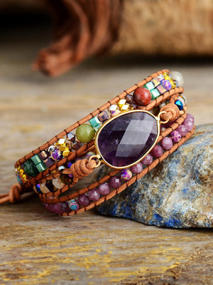 Wrapped amethyst & beaded bracelet with leather straps and mixed gemstone beads.